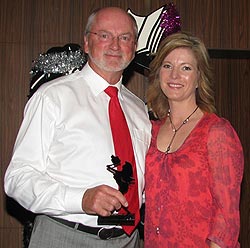 Frank receives his award from ABC TV's news presenter Juanita Phillips.